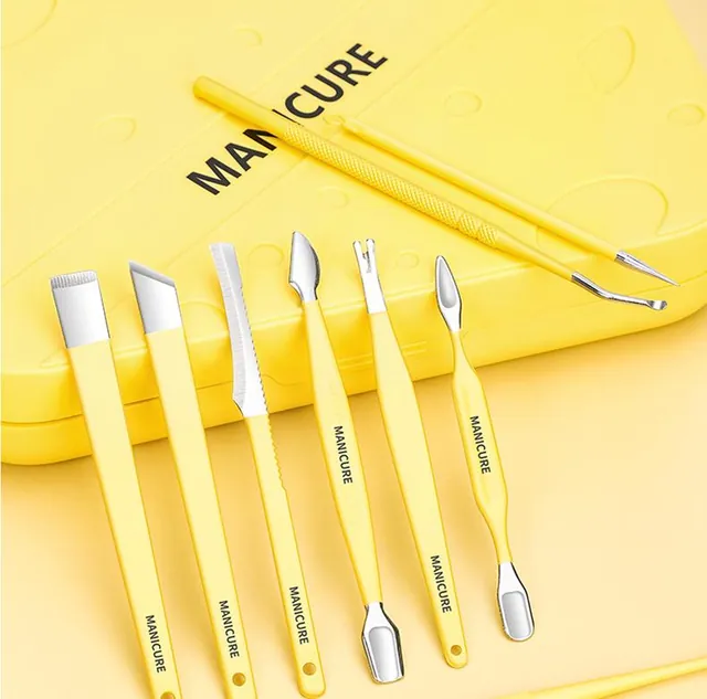 A row of the yellow tools laid out on a yellow background