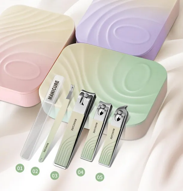 All five pieces laid out on a soft fabric background with the case behind them