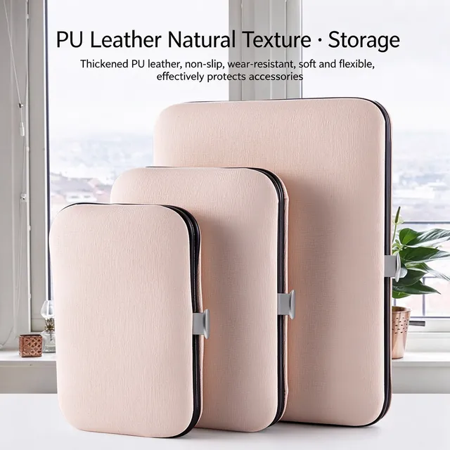 Three zipped pink PU cases stacked to show the three sizes and the leather surface texture
