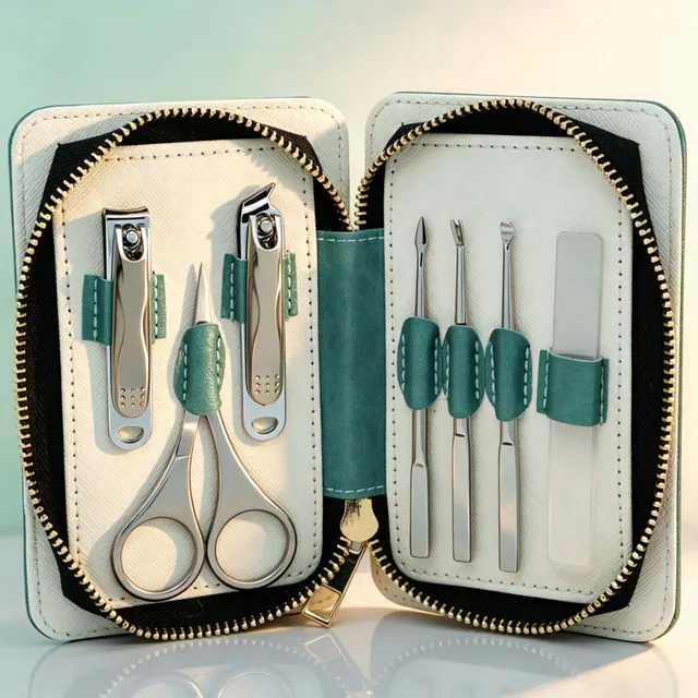 The green marbled case open with its tools on elastic loops