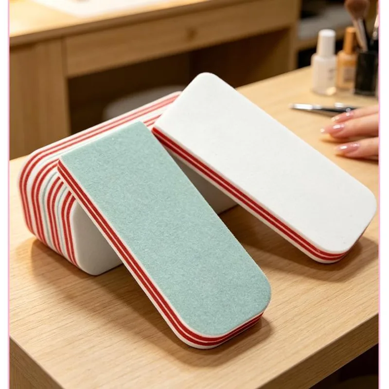 White double-sided polishing blocks with green faces on a wooden desk