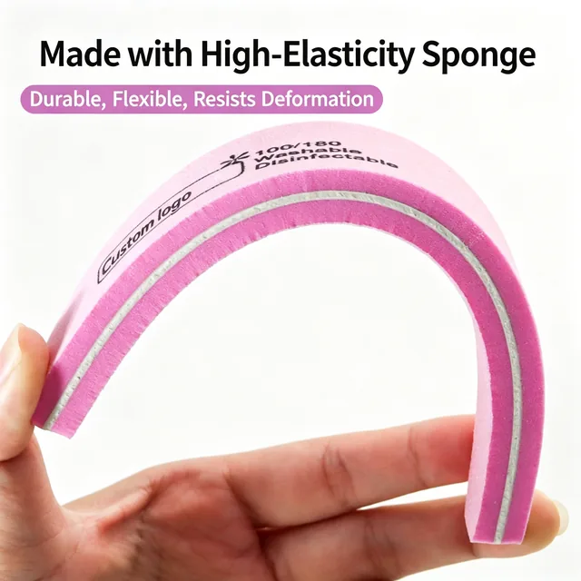 Half-moon sponge nail file bent into an arch to show its elasticity