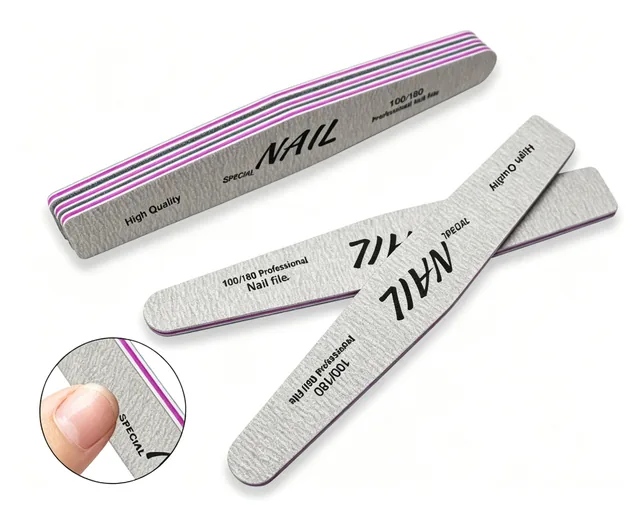 Stack of grey double-sided nail files showing the coloured sponge layer at the edges