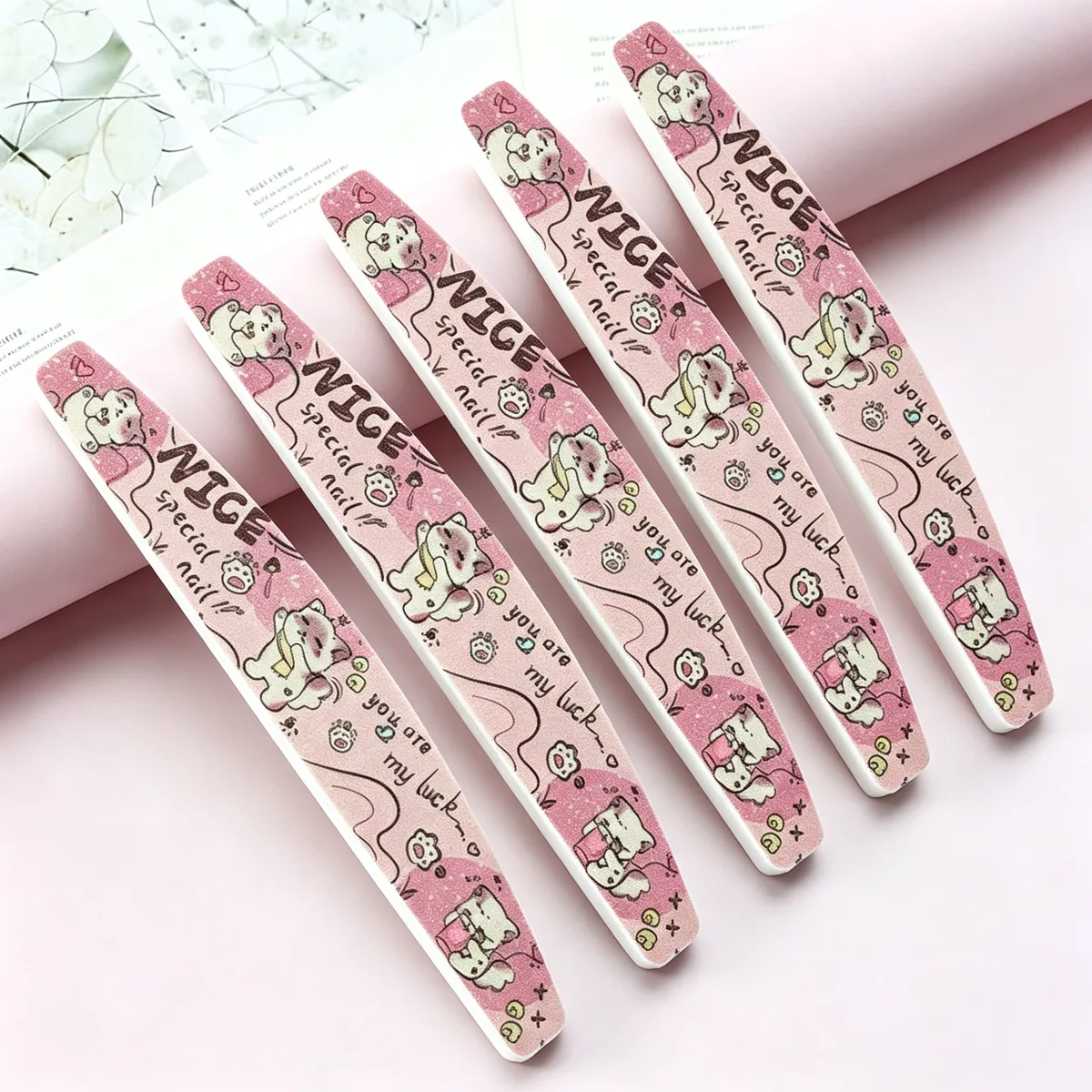 Cartoon cat print pink nail file with printed artwork across the face