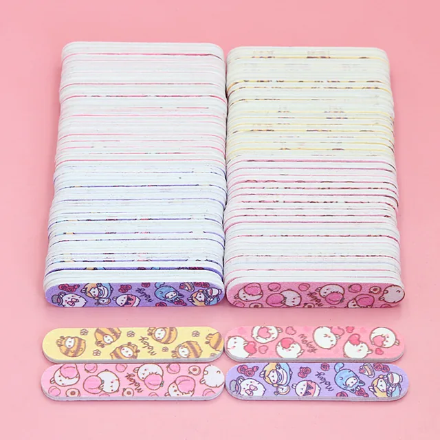 Two block stacks of mini nail files shown edge-on with four printed faces laid out below